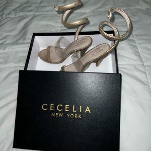 Soft gold snake skin heels.